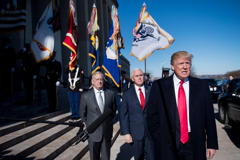 Secretary of Defense James Mattis, left, and Vice President Mike Pence, center, listen while President Donald Trump speaks before a meeting in the Pentagon.
